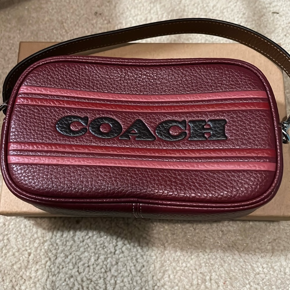 NWOT Coach Mini Jane Wristlet with retro strip